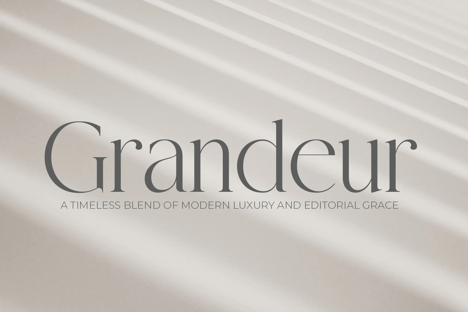 Grandeur – Elegant Classic Serif Font featuring high stroke contrast between thick and thin lines and sharp, refined serifs
