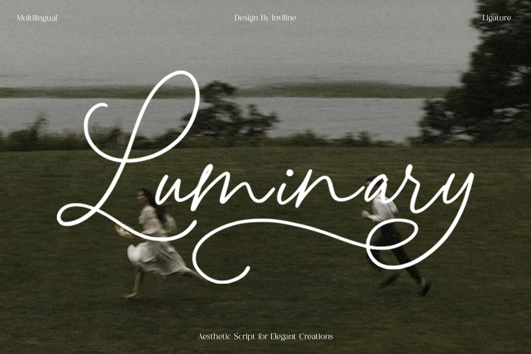 Luminary font preview displaying a decorative script font over a landscape photograph with smaller sans serif text at the top and bottom.