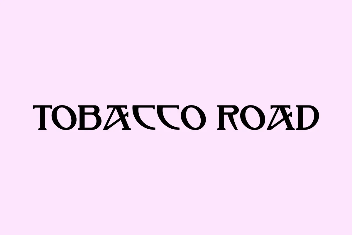 Tobacco Road font preview showing uppercase black lettering on a pale pink background.